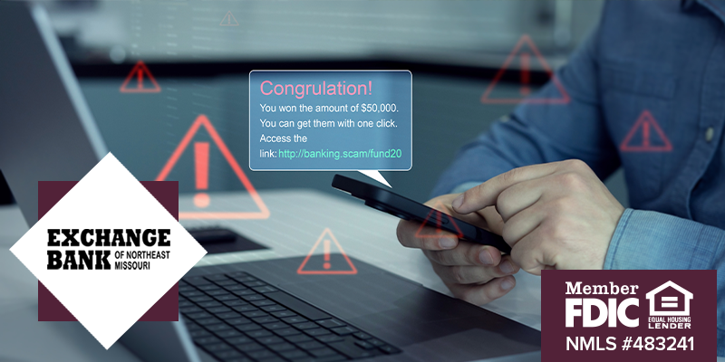 Man in front of laptop holding a cellphone that has a scam text popping up above it